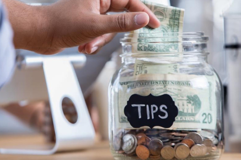 tips, a jar of money